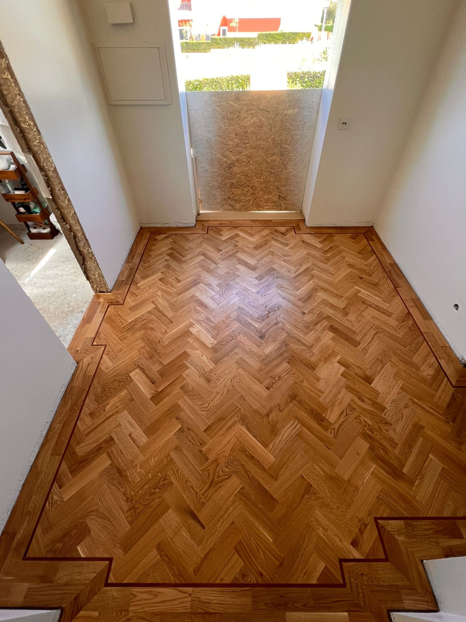 Solid oak parquet with mahogany border installed in a Quinta near Lagos, Algarve